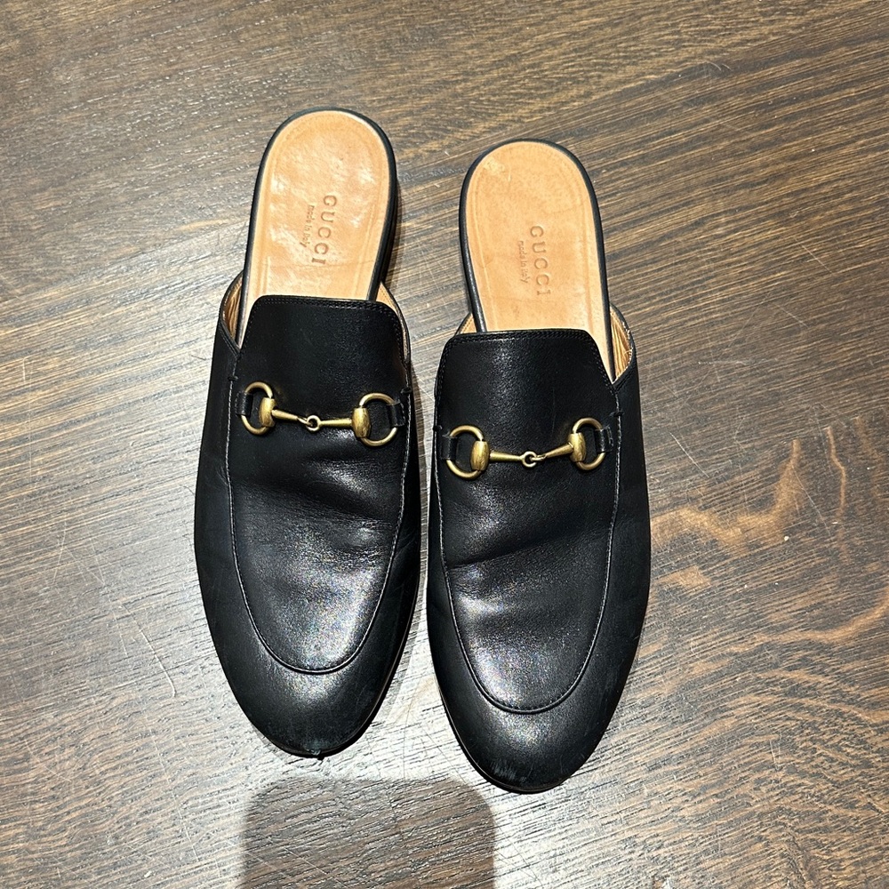 Gucci Black Leather Mules with Gold Accents